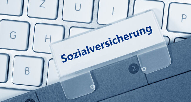 Tastatur mit Ordneretikett Sozialversicherung